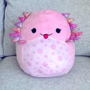 Medium pink dinosaur squishmallow
